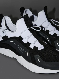 Cropp Sneakersy*Czarno-białe sneakersy z odblaskowymi detalami