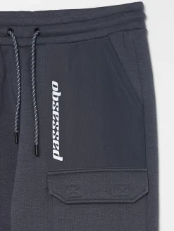 Cropp Spodnie*Dresowe joggery z efektem reflective