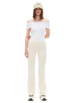 Cropp Spodnie*Kremowe dresy typu flare