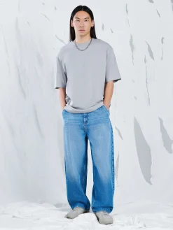 Cropp Jeansy*e jeansy skater z efektem sprania