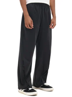 Cropp Spodnie*Spodnie comfort fit z efektownymi rozcięciami